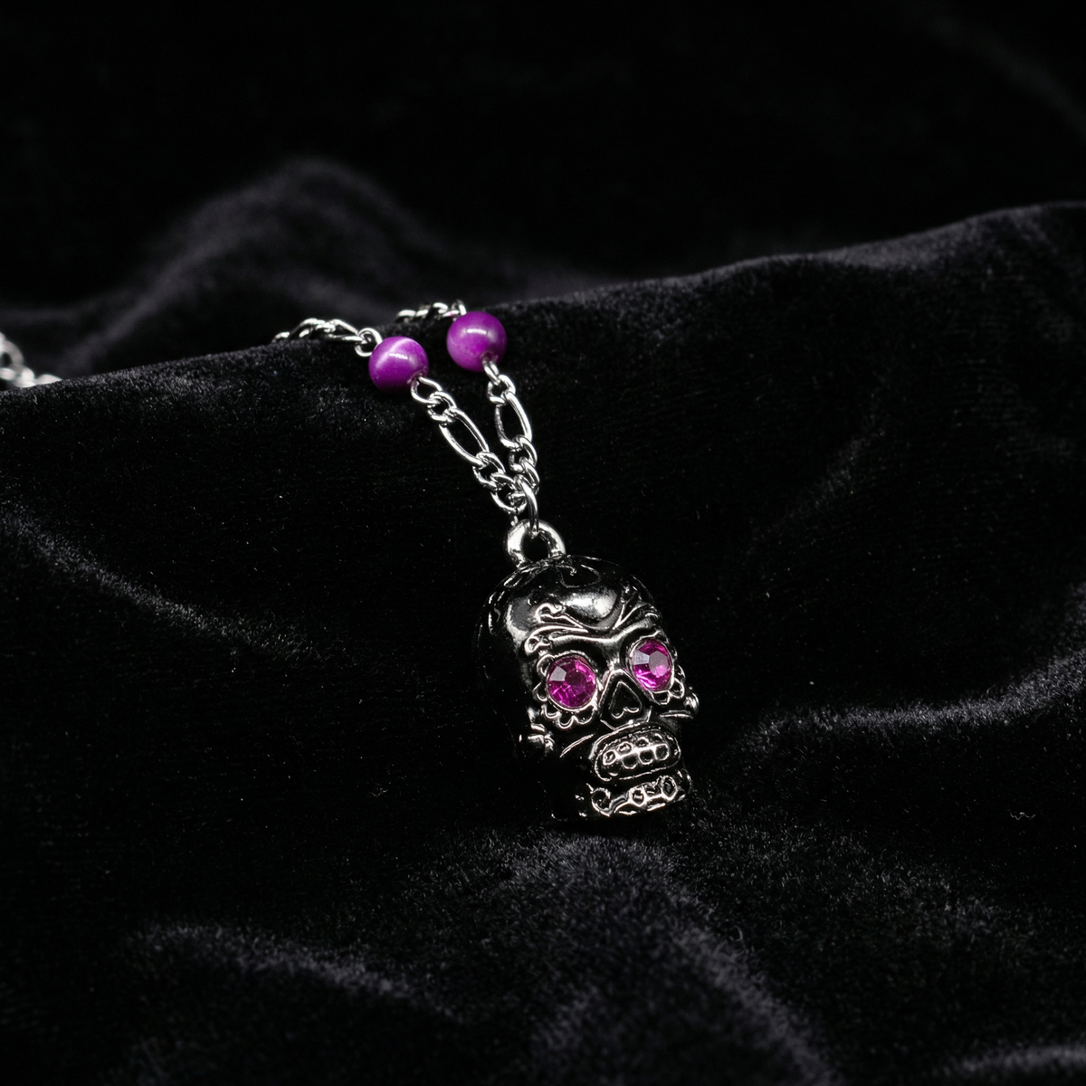 Sourpuss Silver Skull Pendant Necklace | Sugar Skull with Rhinestone Eyes β Clear & Purple Options