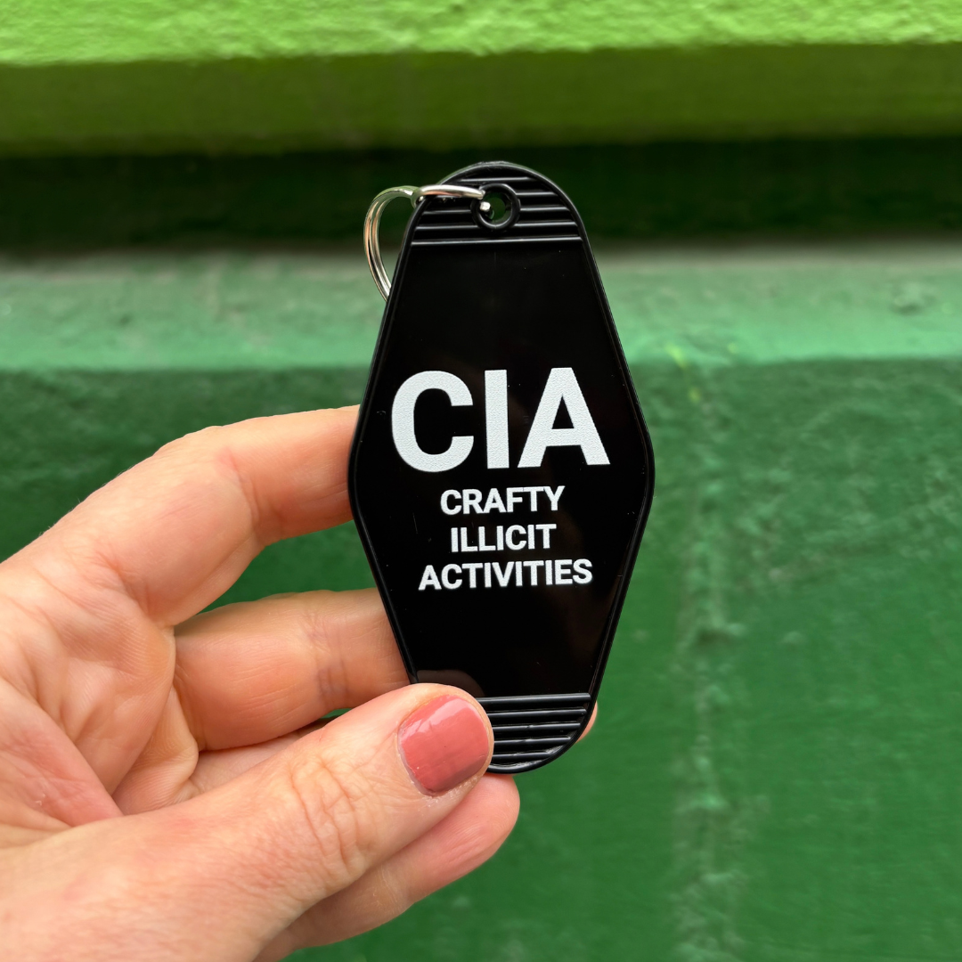 Crafty Illicit Activities Motel Style Keychain in Black