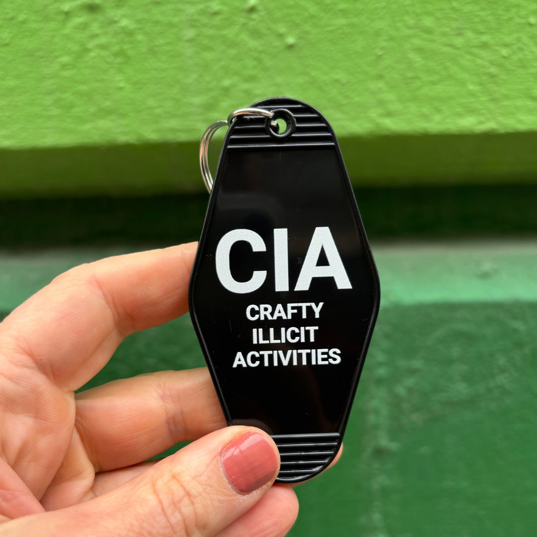 Crafty Illicit Activities Motel Style Keychain in Black