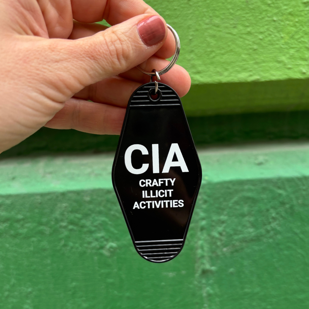 Crafty Illicit Activities Motel Style Keychain in Black