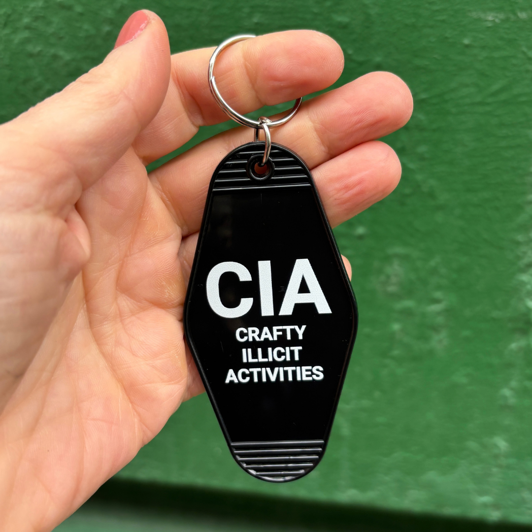 Crafty Illicit Activities Motel Style Keychain in Black